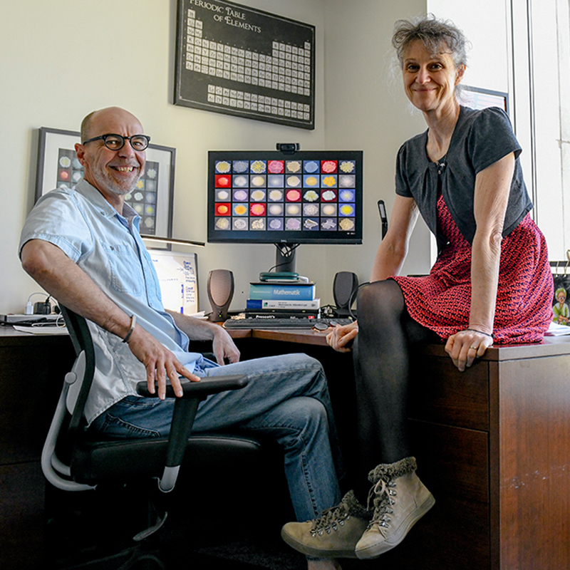Dr. Dick and Dr. Dartois in an office